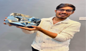 a man holding a silver object